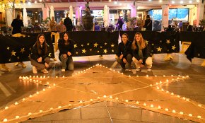 El projecte  «Il·lumina la dana» encèn 288 espelmes i recapta prop de 400 euros per l'escola Immaculada de Paiporta