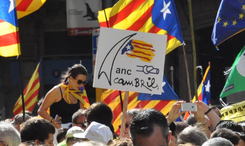Cartell de l'ANC de  Cambrils a la manifestació de la Diada de l'any passat, a Barcelona